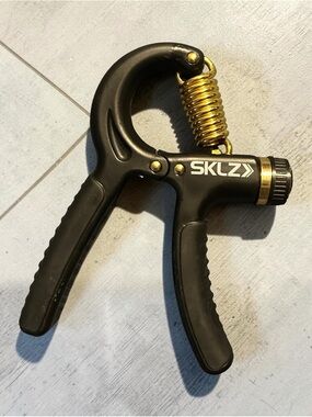 SKLZ Black and Gold Adjustable Hand Grip Strengthener